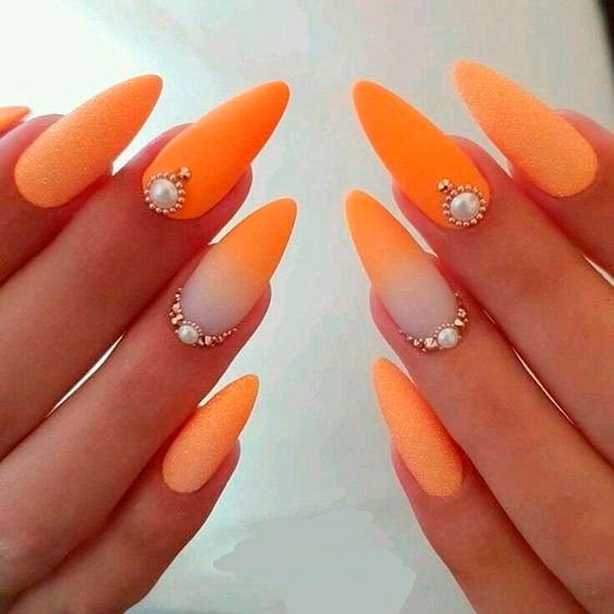Orange Manicure for wedding guests